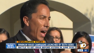 San DIego City Council President, Todd Gloria, surrounded by SEIU and other union members announces efforts to stop you from signing petitions to put minimum wage on the ballot. Photo: 10News