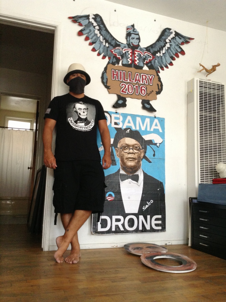 SABO with his Hillary Flying Monkeys creation and Samuel L Jackson Drone piece.  Photo: Victoria Taft